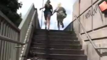 Brown-haired woman urinating on blonde who's eager to get fucked.